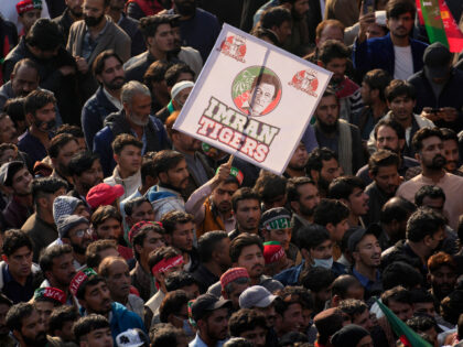 Supporters of Pakistan's former Prime Minister Imran Khan's 'Pakistan Tehreek-e-Insaf' party attend a rally, in Rawalpindi, Pakistan, Saturday, Nov. 26, 2022. Khan said Saturday his party was quitting the country's regional and national assemblies, as he made his first public appearance since being wounded in a gun attack earlier this …