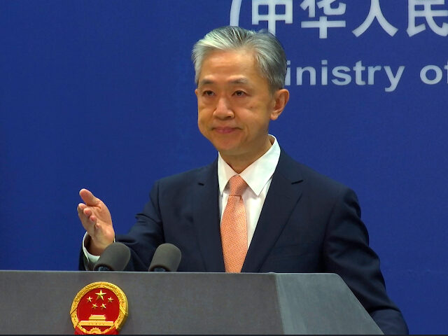 FILE - Chinese Foreign Ministry spokesperson Wang Wenbin reacts during the daily presser a