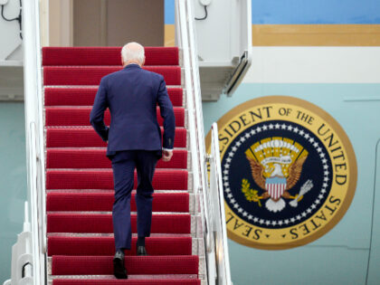 President Joe Biden boards Air Force One at Andrews Air Force Base, Md., Thursday, Jan. 19, 2023, en route to California. (AP Photo/Jess Rapfogel)