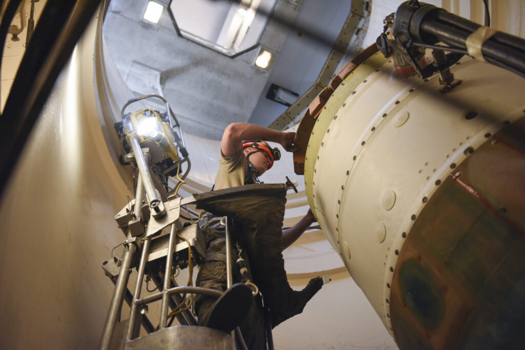 In this image provided by the U.S. Air Force, Airman 1st Class Jackson Ligon, 341st Missile Maintenance Squadron technician, prepares a spacer on an intercontinental ballistic missile during a Simulated Electronic Launch-Minuteman test Sept. 22, 2020, at a launch facility near Malmstrom Air Force Base in Great Falls, Mont. The U.S. says it is tracking a suspected Chinese surveillance balloon that has been spotted over U.S. airspace for a couple days but the Pentagon decided not to shoot it down due to risks of harm for people on the ground. One of the places the balloon was spotted was Montana, which is home to one of the nation's three nuclear missile silo fields at Malmstrom Air Force Base (Tristan Day/U.S. Air Force via AP)