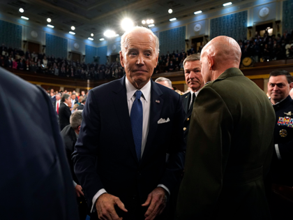 President Joe Biden walks from the podium after delivering the State of the Union address