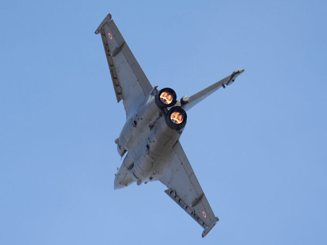A French-made Rafale fighter jet performs aerobatic maneuvers during rehearsals ahead of t