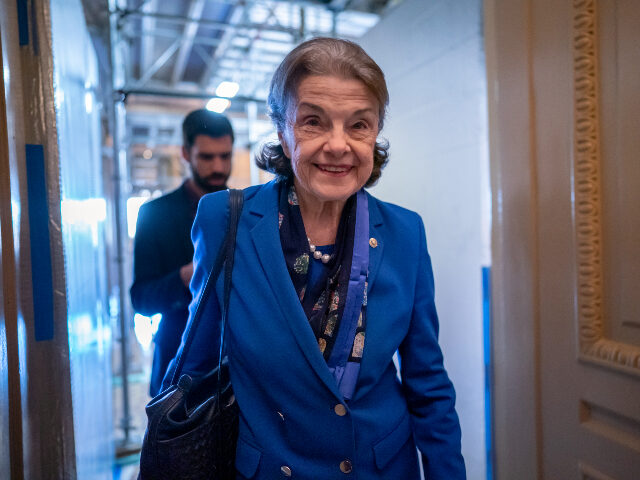 Sen. Dianne Feinstein, D-Calif., walks through a Senate corridor after telling her Democratic colleagues that she will not seek reelection in 2024, at the Capitol in Washington, Tuesday, Feb. 14, 2023. (AP Photo/J. Scott Applewhite)