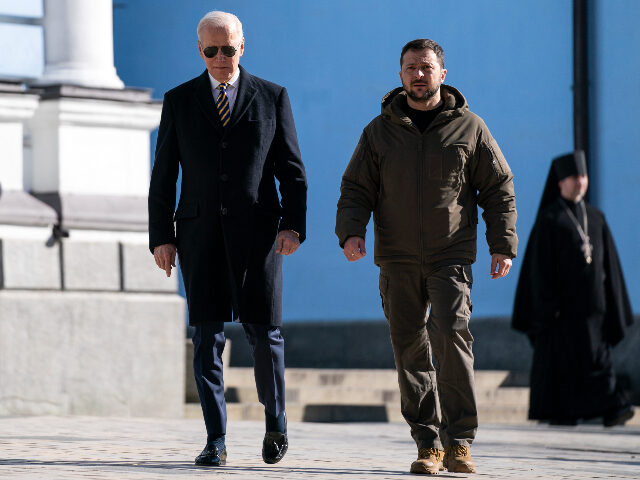 US President Joe Biden, left, walks with Ukrainian President Volodymyr Zelenskyy at St. Mi