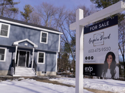 A "For Sale" sign is posted outside a single family home, Tuesday, Feb. 7, 2023,