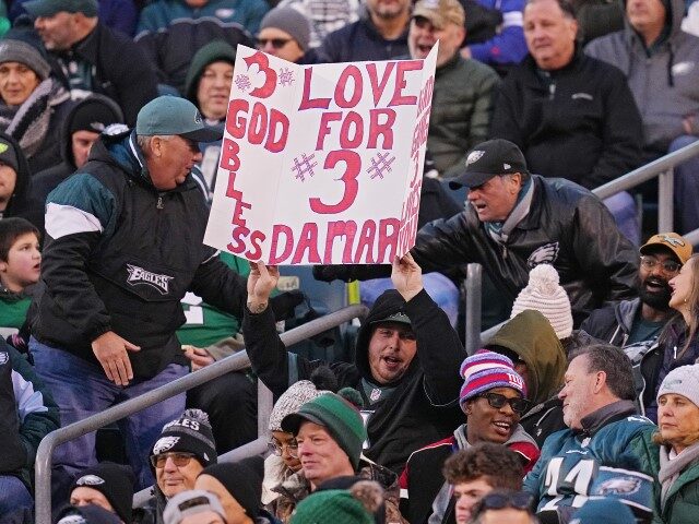 New York Giants v Philadelphia Eagles PHILADELPHIA, PENNSYLVANIA - JANUARY 08: A Philadelphia Eagles fan holds up a sign in support of Damar Hamlin #3 of the Buffalo Bills during their game against the New York Giants at Lincoln Financial Field on January 08, 2023 in Philadelphia, Pennsylvania. (Photo by …
