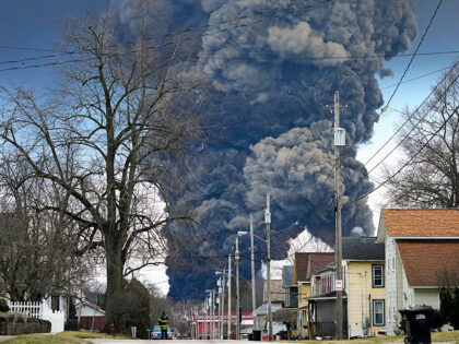 A black plume rises over East Palestine, Ohio, as a result of the controlled detonation of