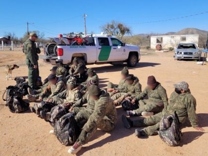 Three Points Station agents apprehended a group of 16 camouflage-wearing migrants near Vamori, Arizona. (U.S. Border Patrol/Tucson Sector)