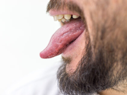 Man with tongue out