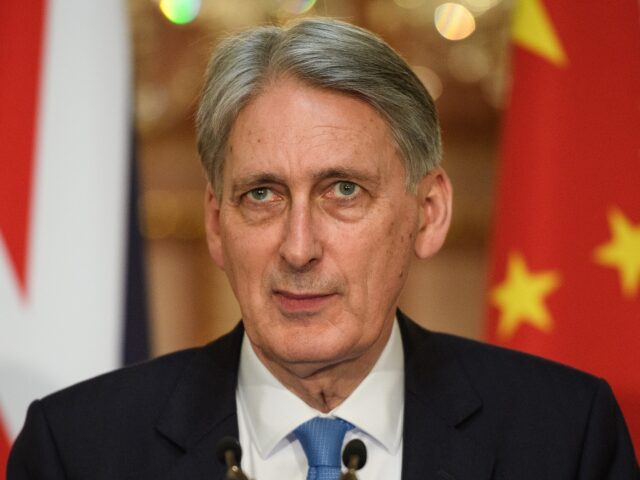 LONDON, ENGLAND - JUNE 17: Britain's Chancellor Philip Hammond takes questions from the me