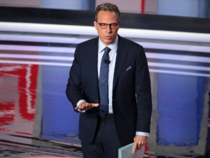 DETROIT, MICHIGAN - JULY 31: CNN moderator Jake Tapper speaks to the crowd attending the D
