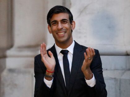 Britain's Chancellor of the Exchequer Rishi Sunak takes part in a national "clap for carer