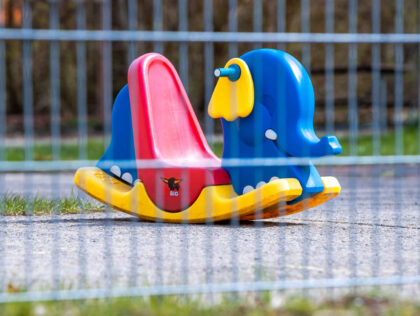 15 April 2021, Mecklenburg-Western Pomerania, Grambow: A seesaw stands in the empty garden of the "Moorgeister" daycare center. Due to the Corona pandemic, Mecklenburg-Western Pomerania is on the verge of a lockdown with curfew restrictions and school and shop closures across the state. Photo: Jens Büttner/dpa-Zentralbild/dpa (Photo by Jens Büttner/picture …