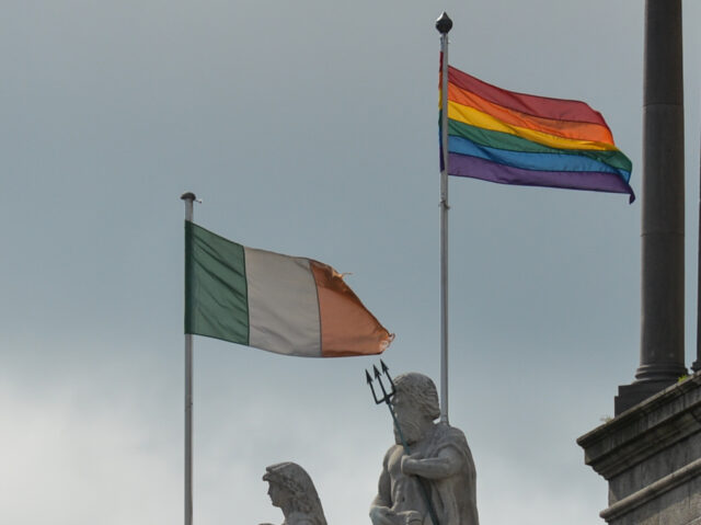 The Irish national flag and the rainbow flag seen at The Custom House in Dublin. On Thursd
