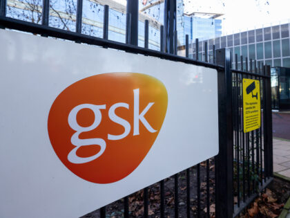 A sign outside the headquarter offices of GlaxoSmithKline Plc in the Brentford district of London, U.K., on Thursday, Jan. 13, 2022. The drugmaker said it remains on track to separately list the consumer arm, which owns brands including Panadol painkillers and Sensodyne toothpaste, in 2022. Photographer: Chris Ratcliffe/Bloomberg via Getty …