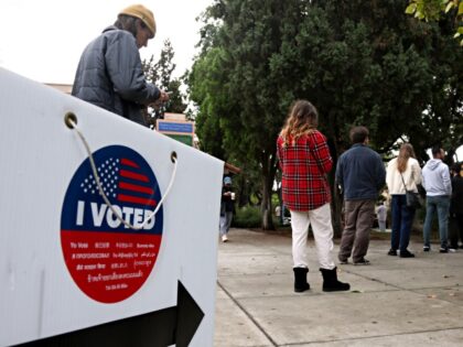 WEST HOLLYWOOD, CA - NOVEMBER 8, 2022 - - Voters wait in line to cast their votes in the midterm elections at Plummer Park in West Hollywood on November 8, 2022. (Genaro Molina / Los Angeles Times)
