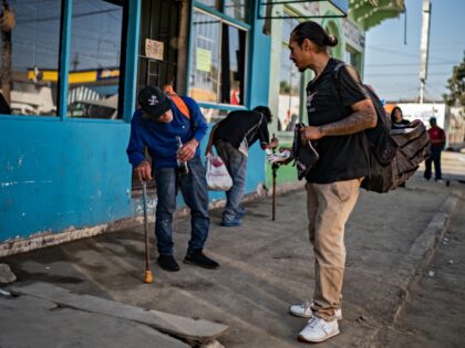 TIJUANA, MEXICO - OCTOBER 21: Jose Gonzalez, who was deported after growing up in California, tries to sell a few items he scavenged to pay for his next hit of fentanyl in the Zona Norte neighborhood of Tijuana, Mexico, Friday, October 21, 2022. (Photo by Salwan Georges/The Washington Post via …