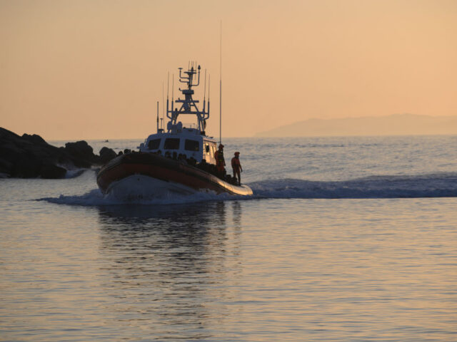 ROCCELLA JONICA, CALABRIA, ITALY - 2022/12/31: A patrol boat with migrants seen arriving a