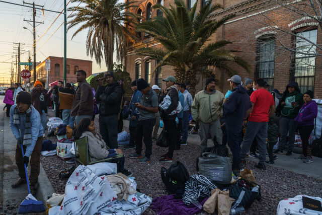 Migrants outside of Sacred Heart Church in El Paso, Texas, US, on Sunday, Jan. 8, 2023. Pr