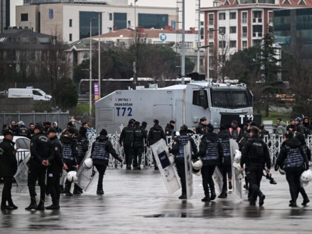 Turkish anti riot police surround Istanbul's courthouse before an adress of doctors w