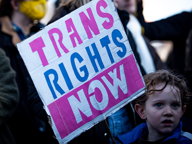 A protestor holds a placard during the Trans Rights Protest. Protests took place in London following the UK Governments blocking of the gender recognition reform which was passed in December 2022. (Photo by Loredana Sangiuliano/SOPA Images/LightRocket via Getty Images)