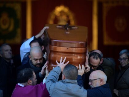Pallbearers carry the casket of late sacristan Diego Valencia after a funeral mass at the Nuestra Senora de La Palma church on Alta square, where he was killed on January 25, in Algeciras, southern Spain, on January 27, 2023. - The city of Algeciras was united in mourning after a …
