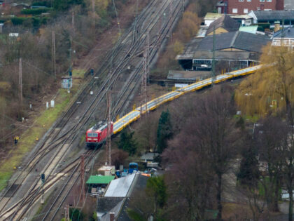 03 February 2023, North Rhine-Westphalia, Recklinghausen: The freight train is still on the tracks in the morning (aerial photo taken with a drone). The line is still closed, train traffic suspended. In a fatal accident in Recklinghausen, two boys were hit by a freight train. The ten-year-old was killed, the …