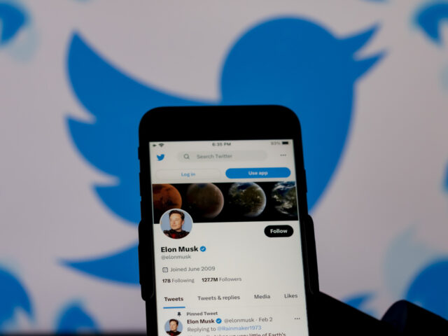 INDIA - 2023/02/03: In this photo illustration, the twitter account of Elon Musk with back