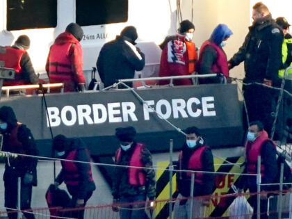 A group of people thought to be migrants are brought in to Dover, Kent, onboard a Border F