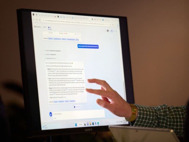 An attendee interacts with the AI-powered Microsoft Bing search engine and Edge browser du
