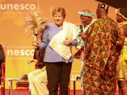 YAMOUSSOUKRO, IVORY COAST - FEBRUARY 08: Former German Chancellor Angela Merkel receives a UNESCO peace prize on Wednesday for her decision to welcome a great number of migrants to Germany, during a ceremony in Yamoussoukro, Ivory Coast on February 08, 2023. (Photo by Cyrille Bah/Anadolu Agency via Getty Images)