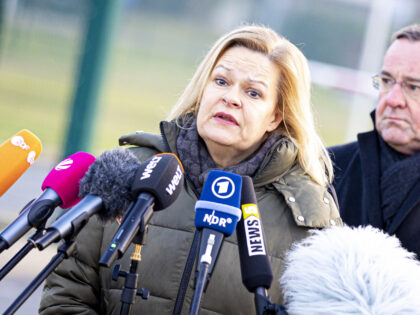 10 February 2023, Lower Saxony, Wunstorf: Nancy Faeser (SPD), Federal Minister of the Interior, and Boris Pistorius (SPD), Minister of Defense, make a press statement at Wunstorf Air Base in the Hanover region. Today, Federal Minister of the Interior Faeser and Defense Minister Pistorius are visiting the Wunstorf air base, …