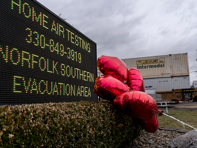 Balloons are placed next to a sign displaying information for residents to receive air-quality tests from Norfolk Southern Railway on February 16, 2023 in East Palestine, Ohio. On February 3rd, a Norfolk Southern Railways train carrying toxic chemicals derailed causing an environmental disaster. (Photo by Michael Swensen/Getty Images)