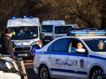 Police and Emergency medical Service are seen on site after at least 18 people were found dead in Bulgaria in an abandoned truck near the capital Sofia, Bulgaria on February 17, 2023. The truck was transporting timber and carrying illegal migrants hidden in a compartment, the country's interior ministry said …