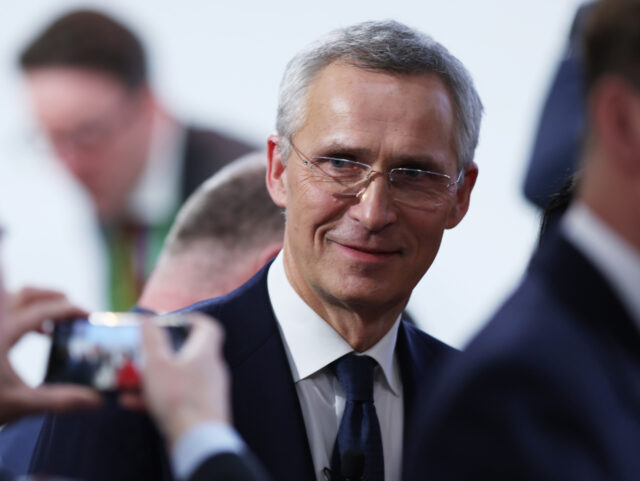 MUNICH, GERMANY - FEBRUARY 18: NATO Secretary General Jens Stoltenberg talks to guests dur