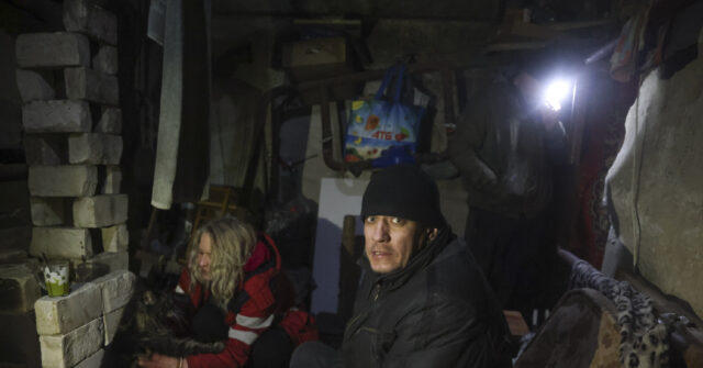 PICS: Civilians Cling On in Ravaged Ukrainian Frontline City