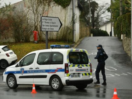 Municipal police secure a perimeter around Saint-Thomas dAquin middle school where a teacher died after being stabbed by a student, in Saint-Jean-de-Luz, southwestern France, on February 22, 2023. - A teacher at a school in southwest France was killed on February 22, in a stabbing attack by a teenage pupil …