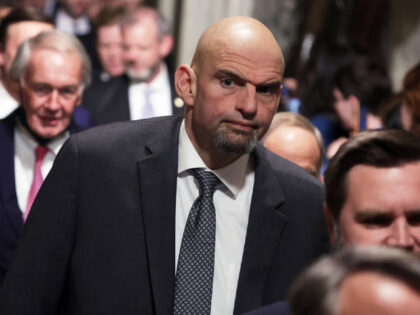 WASHINGTON, DC - FEBRUARY 07: U.S. Sen. John Fetterman (D-PA) walks through the Statuary Hall of the U.S. Capitol prior to President Joe Biden’s State of the Union address at a joint meeting of Congress in the House Chamber of the U.S. Capitol on February 07, 2023 in Washington, DC. …