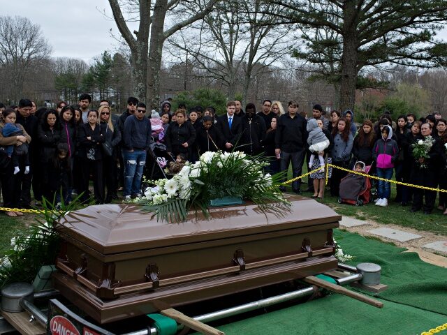 CORAM, NY - APRIL 19: Family and friends say goodbye to Justin Llivicura at his burial in a cemetery on April 19, 2017 in Coram, Long Island, New York. Justin, a sixteen-year-old high school student, was one of four teenagers murdered in a park in Central Islip in what many …
