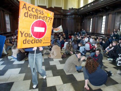 Cambridge University students, recalled protests of the past by staging a sit-in in opposi