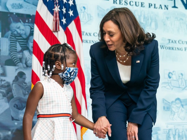 Kamala Harris Smiles and Poses Next to Masked-Up Little Girl - Vimarsana News
