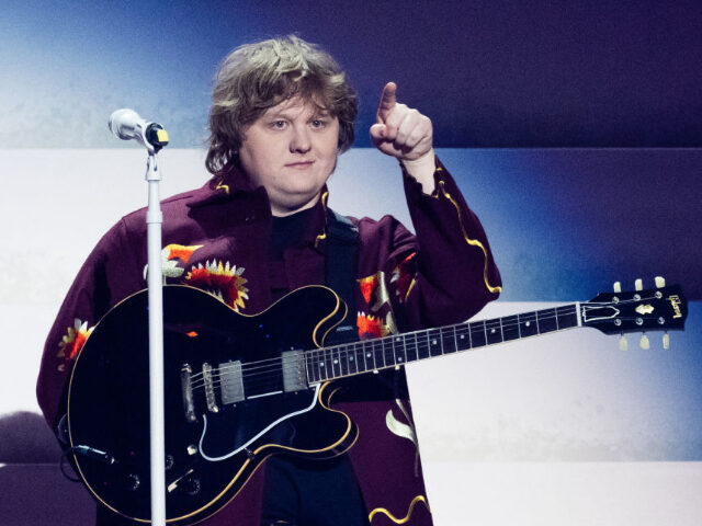 LONDON, ENGLAND - FEBRUARY 11: (EDITORIAL USE ONLY) : Lewis Capaldi performs live on stage during The BRIT Awards 2023 at The O2 Arena on February 11, 2023 in London, England. (Photo by Samir Hussein/WireImage)