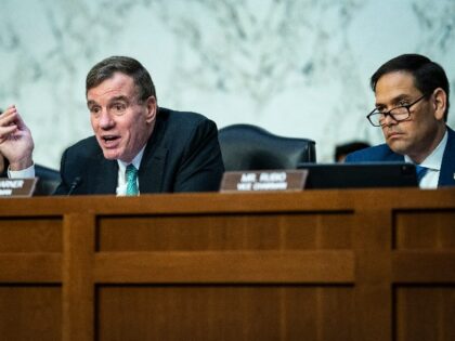 Chairman Mark Warner, D-Va., left, and Sen. Marco Rubio, R-Fla., speak during a Senate Intelligence Committee hearing on worldwide threats as Russia continues to attack Ukraine, on Capitol Hill on Thursday, March 10, 2022 in Washington, DC. (Photo by Jabin Botsford/The Washington Post via Getty Images)