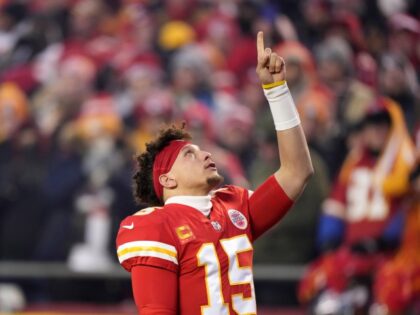 Super Bowl Prayer Spotlight Football FILE - Kansas City Chiefs quarterback Patrick Mahomes reacts before the NFL AFC Championship playoff football game against the Cincinnati Bengals, Sunday, Jan. 29, 2023, in Kansas City, Mo. Public display of faith is nothing new in football or sports.(AP Photo/Charlie Riedel, File)
