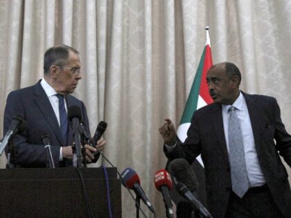 Russian Foreign Minister Sergei Lavrov, left, and Sudanese acting foreign minister Ali al-Sadiq give a joint press conference at the airport in Khartoum, Sudan, Thursday, Feb. 9, 2023. (AP Photo/Marwan Ali)
