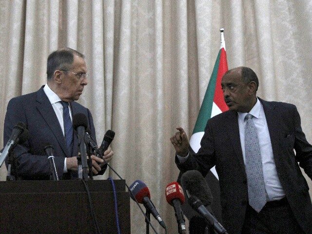 Russian Foreign Minister Sergei Lavrov, left, and Sudanese acting foreign minister Ali al-