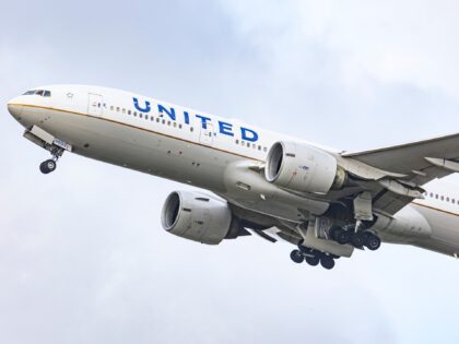 United Airlines Boeing wide body 777-200 aircraft as seen during take off and flying phase