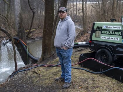Environmental And Health Concerns Grow In East Palestine, Ohio After Derailment Of Train Cars Containing Hazardous Material EAST PALESTINE, OH - FEBRUARY 22: Wade Lovett, 40, poses for a portrait along Leslie Run creek on February 22, 2023 in East Palestine, Ohio. Lovett was working at Rollerena Auto Sales when …