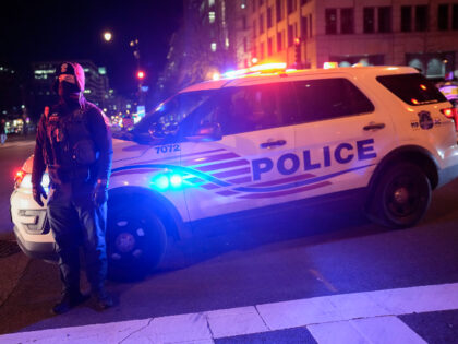 D.C. Metropolitan Police block K Street NW as demonstrators protest Friday, Jan. 27, 2023,