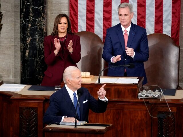 President Joe Biden arrives to deliver the State of the Union address to a joint session of Congress at the U.S. Capitol, Tuesday, Feb. 7, 2023, in Washington. Vice President Kamala Harris and House Speaker Kevin McCarthy of Calif., applaud. (AP Photo/Patrick Semansky)